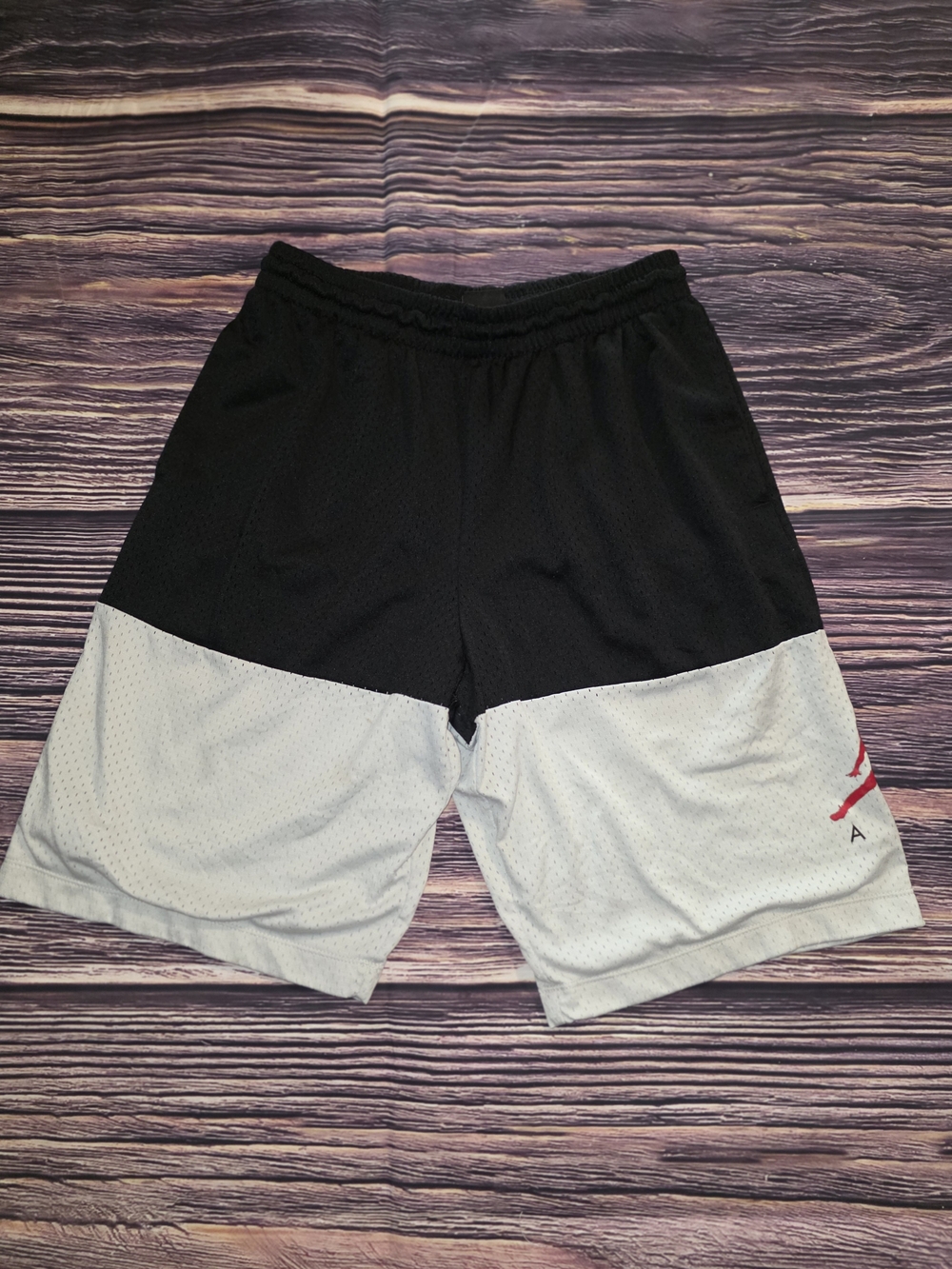 These are black and white Nike Jordan Jumpman Air youth mesh basketball shorts f